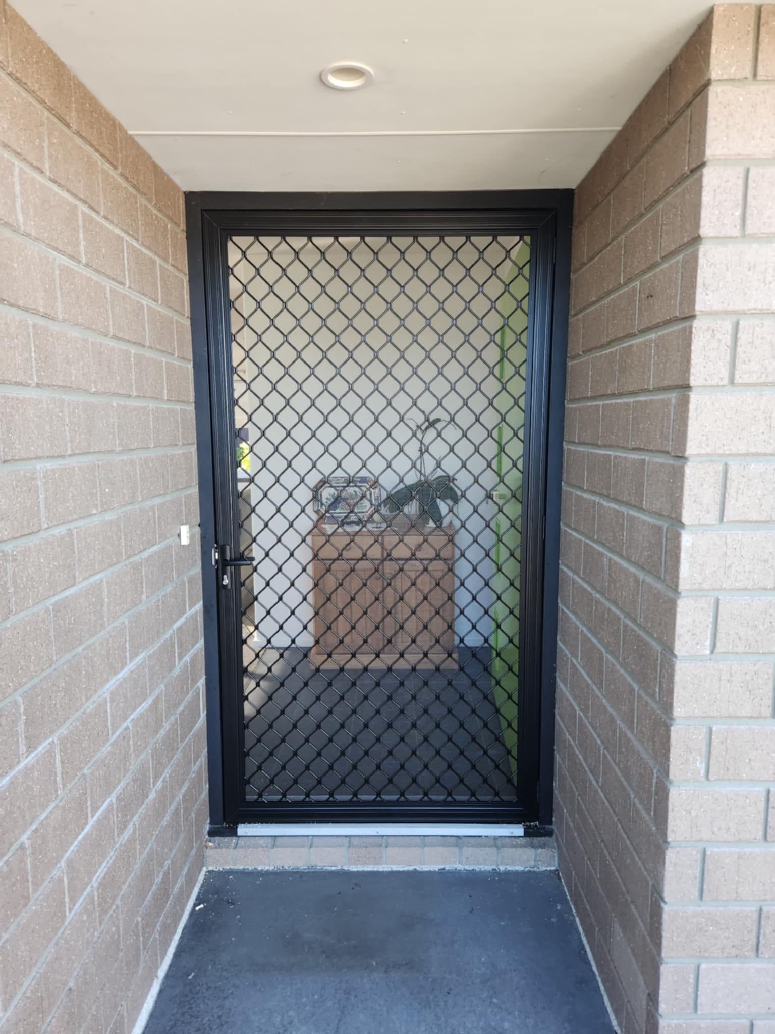 Amplimesh flywire door — custom fitted by Garage Door Warehouse