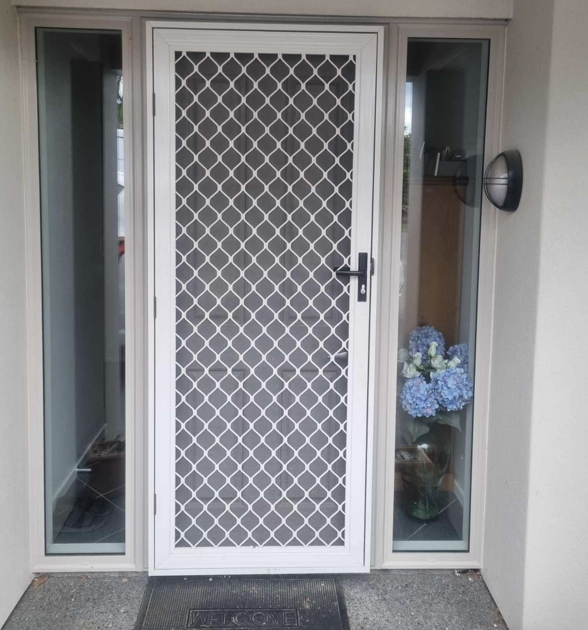 Amplimesh security door installation by Garage Door Warehouse