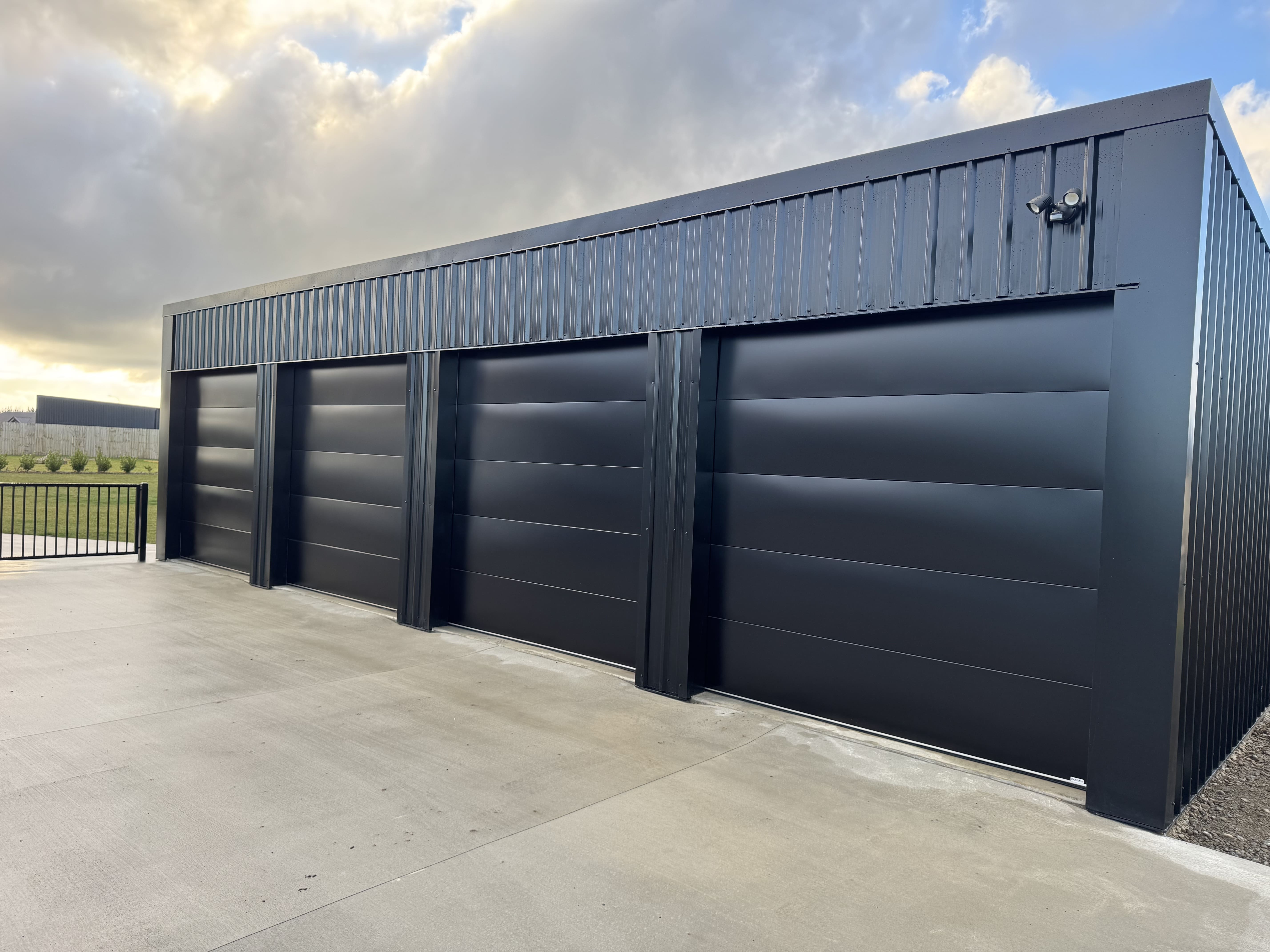 Garage Door Warehouse team in workshop